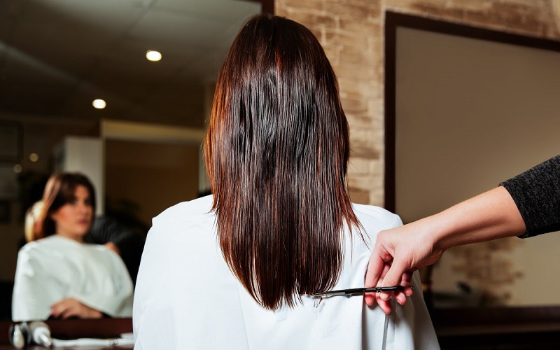 woman in the hair salon doing her hair